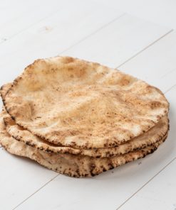 Alternative Plain Pita Bread on White Wooden Board